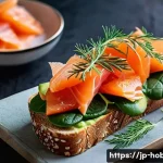 오픈 샌드위치 - **Prompt:** A vibrant and artfully arranged open sandwich, presented like a culinary masterpiece on ...